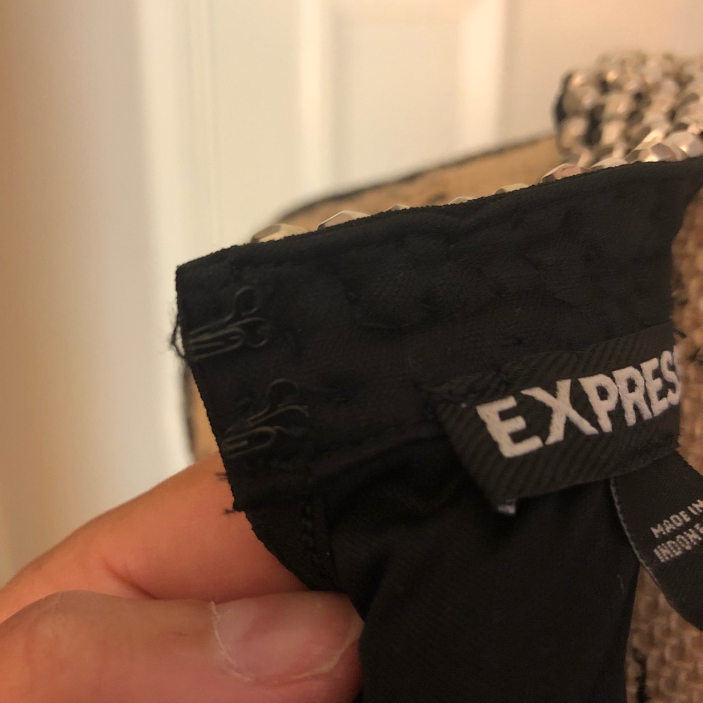 Size M, Black EXPRESS, sleeveless dress shirt.